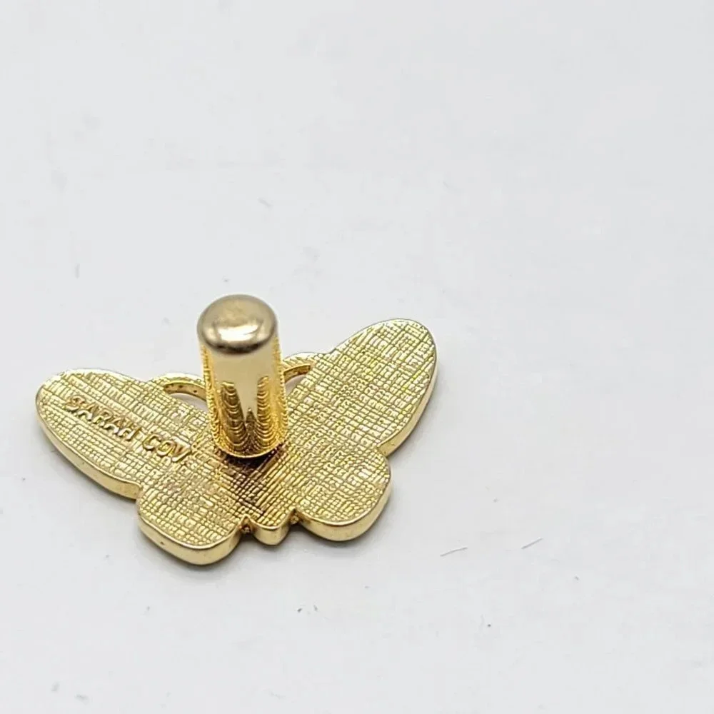 Sarah Coventry Gold Tone White Enamel Confetti Butterfly Pin Cork Back Vintage